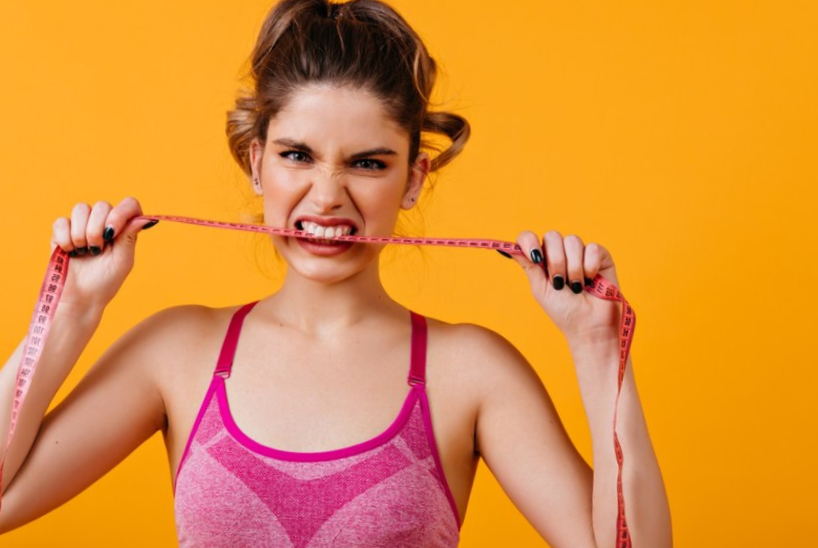 Portrait of angry woman on diet