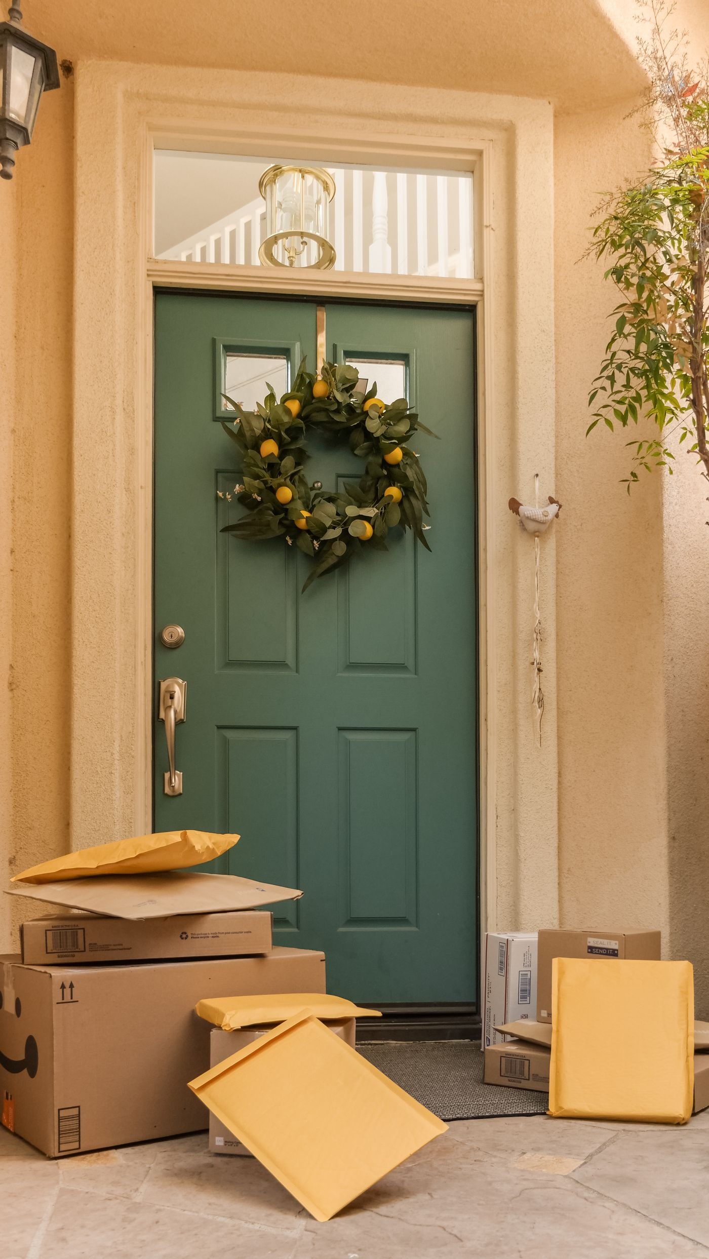 Stock photo of delivery parcels at a front door. Not a listed product.