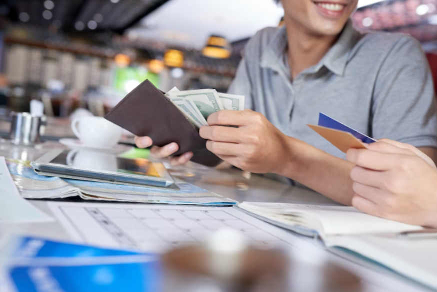 Free photo cropped people checking their wallet for money and bank card