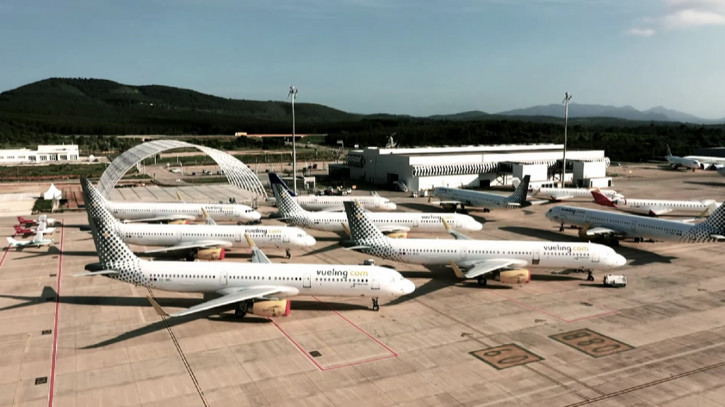 many vueling aircrafts at the airport