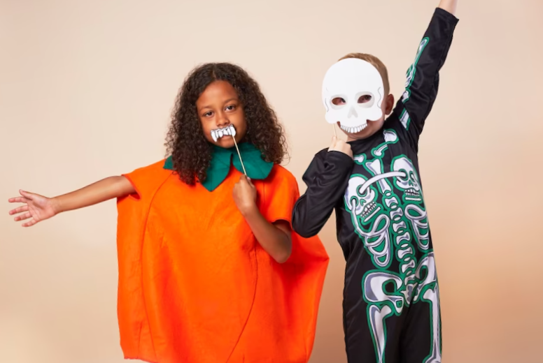 cheerful children with halloween costume