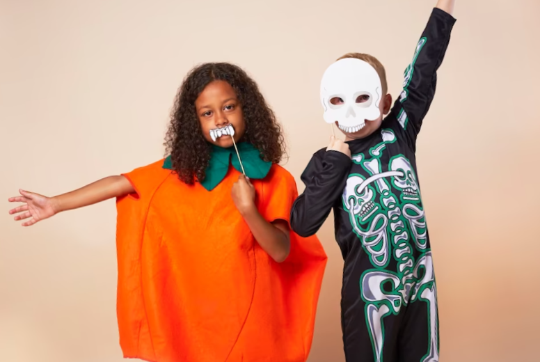 cheerful children with halloween costume
