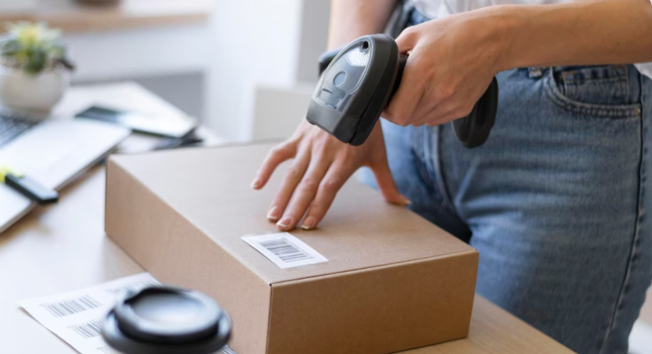close up hand holding scanner