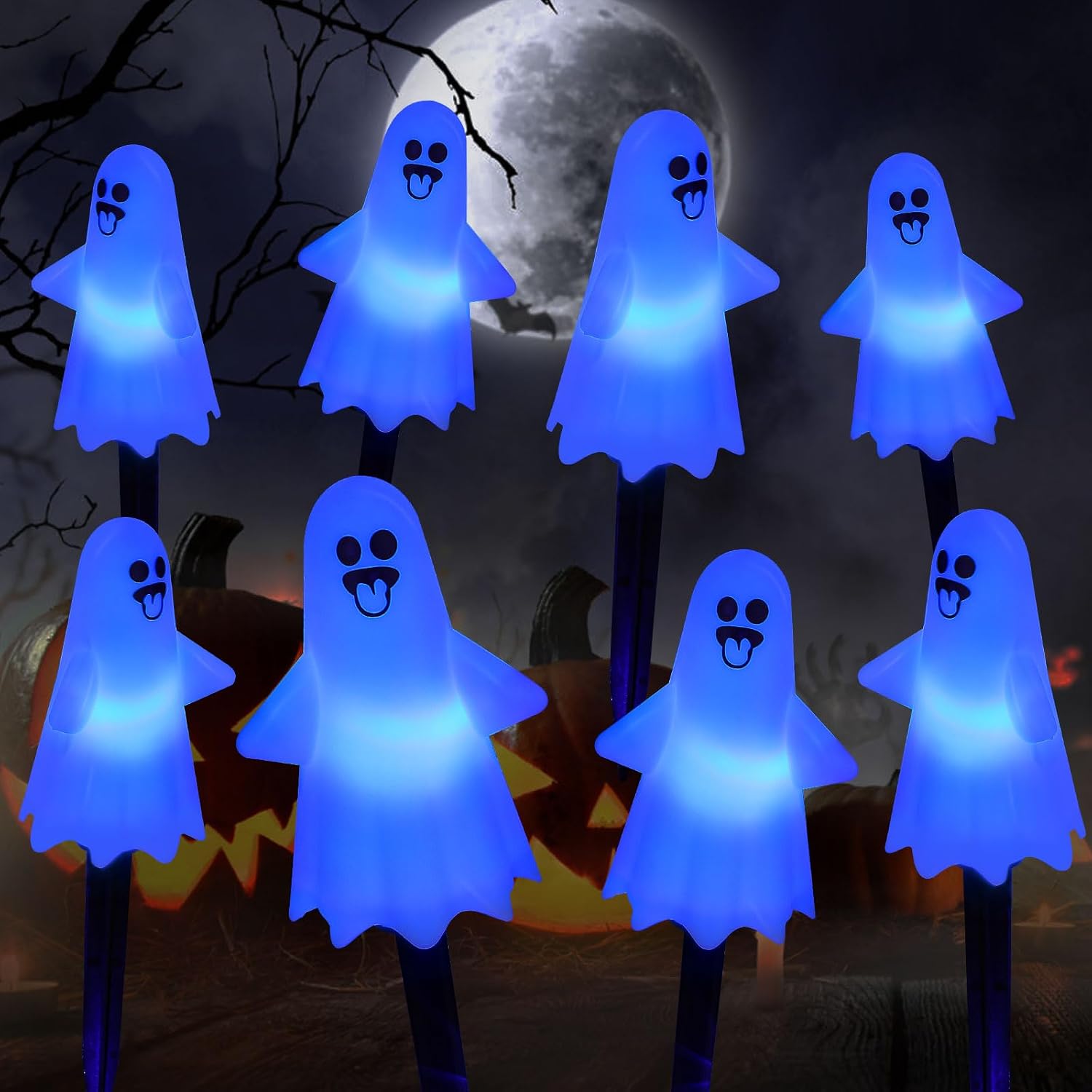 Three solar light-up ghost pathway stakes