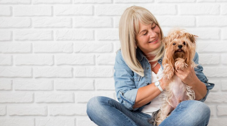 Medium shot happy woman with dog