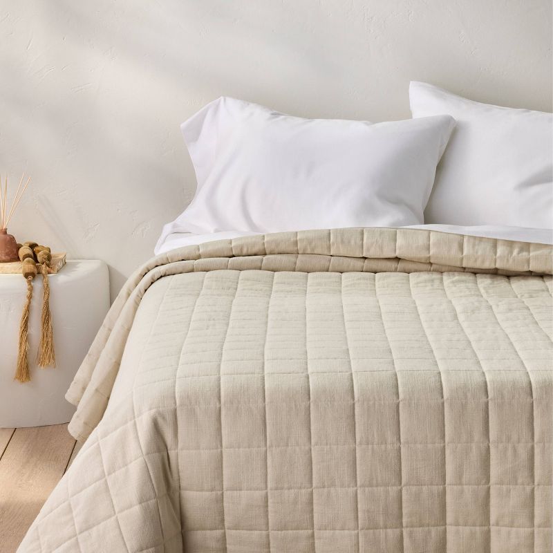 Casaluna heavyweight linen blend quilt in natural on a bed