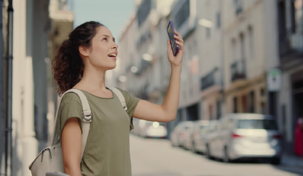 woman using location application on her smartphone