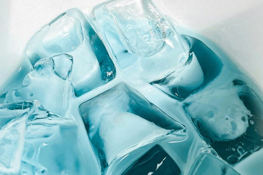 Close-up of clear blue ice cubes