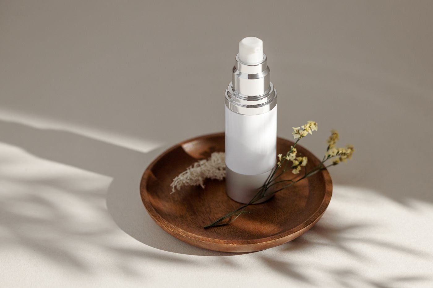 Stock photo of a white bottle on a wooden tray. Not a listed product.